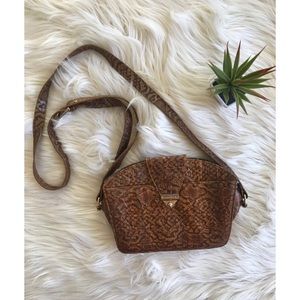 Embossed cross body bag